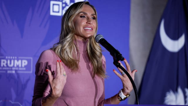 A photo of Lara Trump at a campaign rally for her father-in-law.