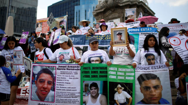 Relatives of missing people take part in a protest for victims in Mexico City.