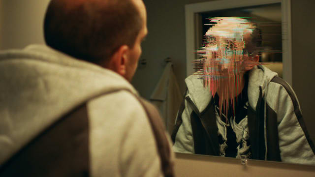 A photo including Micah Spayer as Grant Amato in the docuseries Ctrl+Alt+Desire on Paramount+