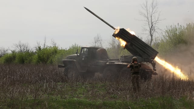 Ukrainian gunners fire rockets.