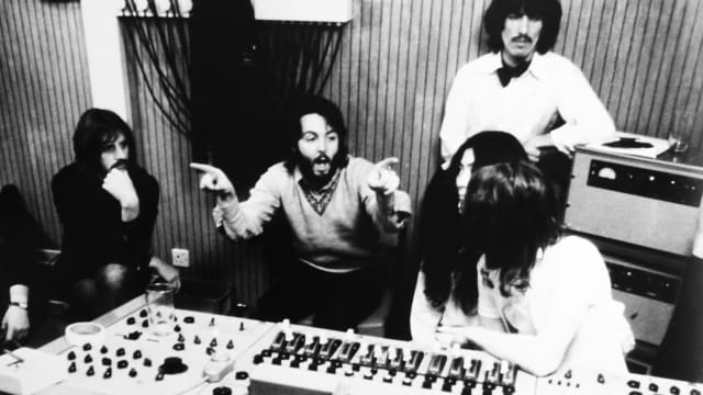 Ringo Starr, Paul McCartney, George Harrison, Yoko Ono, and John Lennon in the studio in a still from ‘Let it Be’