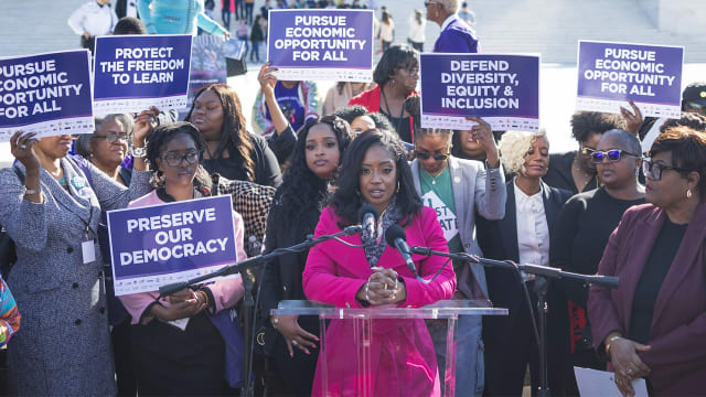 Fearless Fund CEO Arian Simone, center, speaks outside U.S. Supreme Court in Washington, D.C.