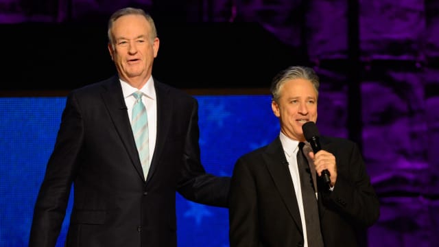 Bill O'Reilly and Jon Stewart onstage together in 2012.