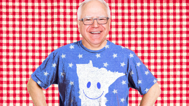 Tim Walz in a shirt with a smiley face on Minnesota