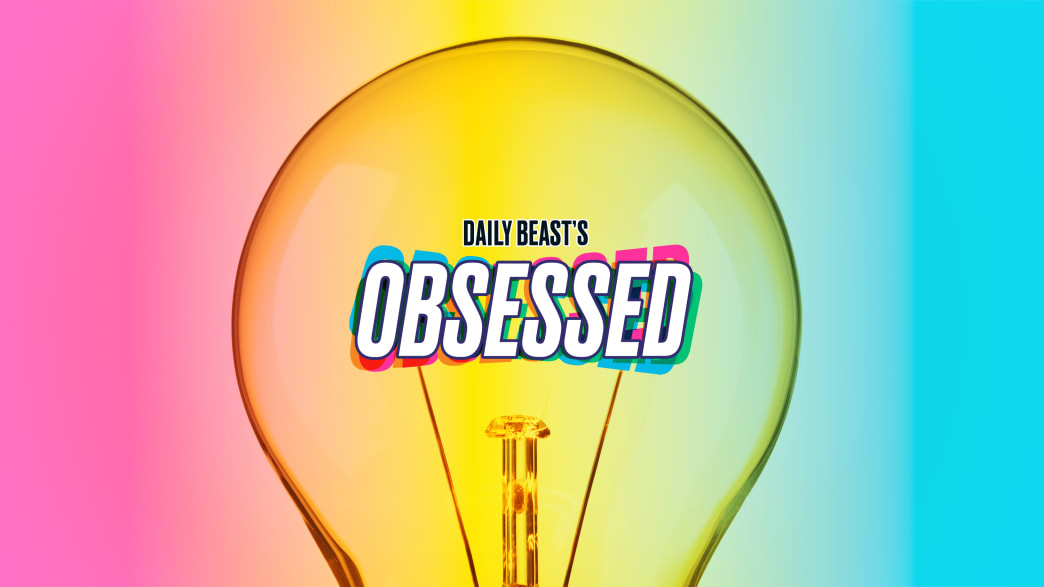 A lightbulb with the words Daily Beast’s Obsessed in the center of it.