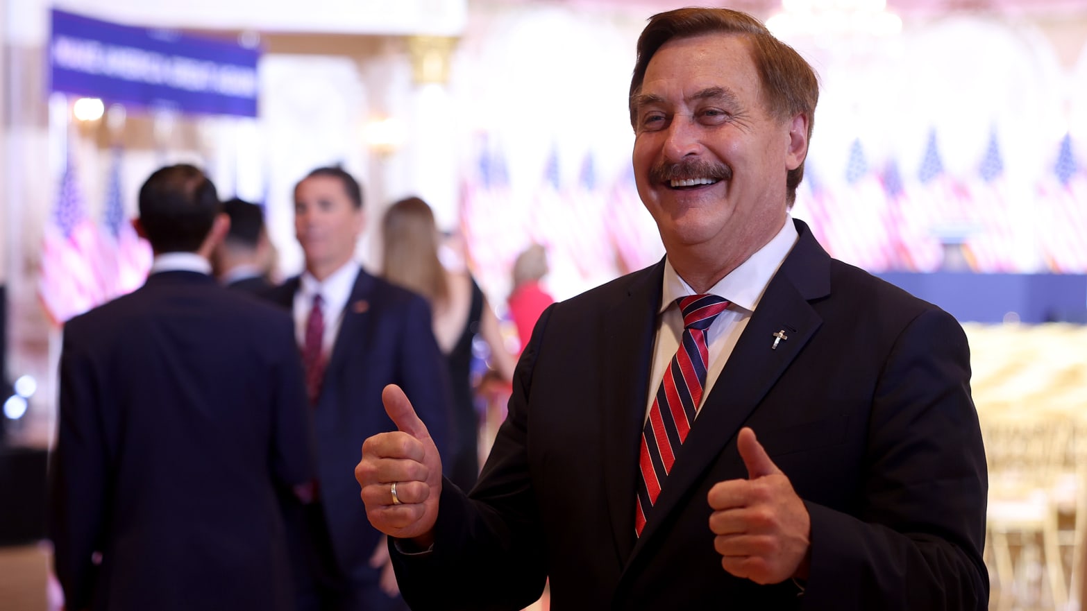 Mike Lindell speaks to the press before a Donald Trump speech in Florida.