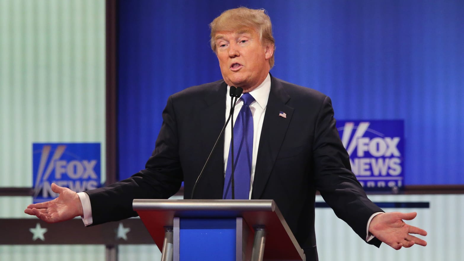Republican presidential candidate Donald Trump participates in a 2016 debate sponsored by Fox News