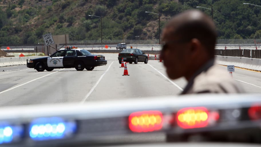 California Highway Patrol officers are seen on one of the busiest freeways in California, the 405