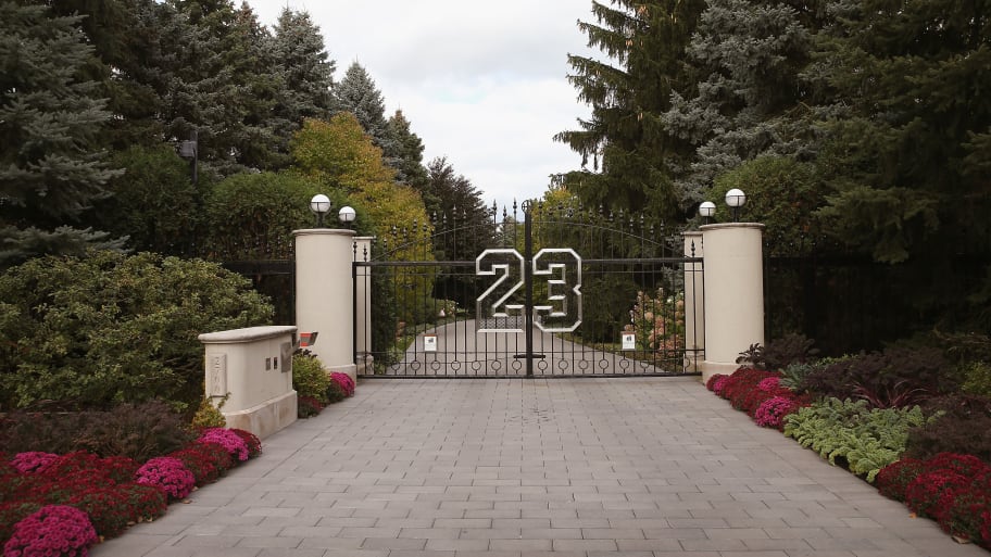 A gate with the number 23 controls access to the home of basketball legend Michael Jordan.