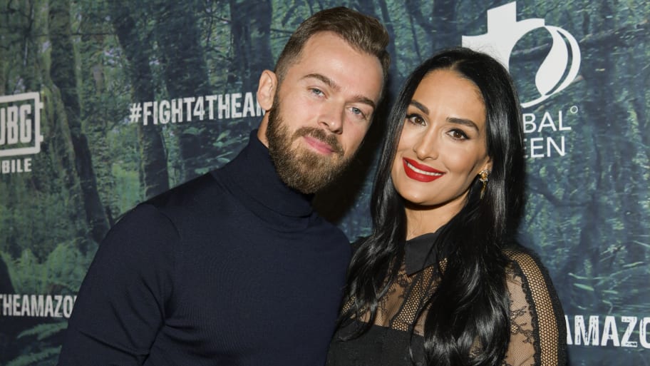 Artem Chigvintsev and Nikki Bella at an event in 2019.