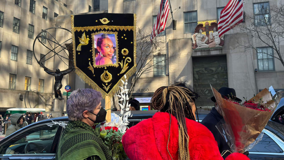 Mourners honor Cecilia Gentili outside St. Patrick's Cathedral.