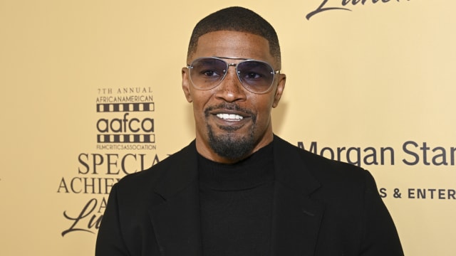 Jamie Foxx on the red carpet at the AAFCA Special Achievement Awards Luncheon in 2023.