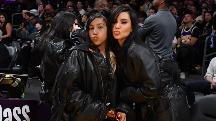  Kim Kardashian (R) and North West attend a basketball game between the Los Angeles Lakers and the Golden State Warriors at Crypto.com Arena on April 09, 2024 in Los Angeles, California.