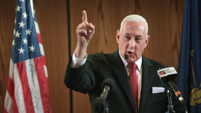 A picture of GOP Rep. Greg Pence speaking at a lectern.