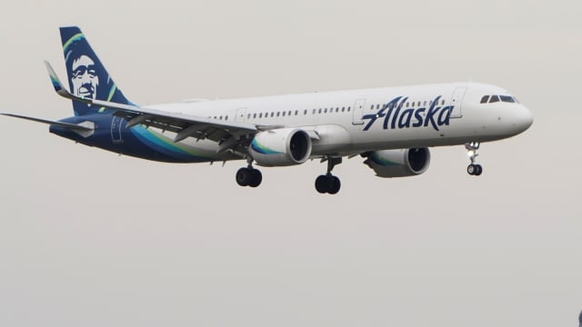 An Alaska Airlines plane prepares to land.