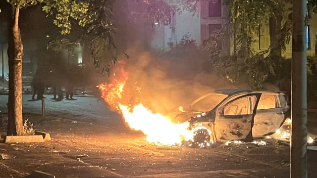 A car set on fire as riots erupted in the Paris suburbs over the police shooting of teen driver Nahel M. in Nanterre.