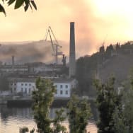 "Smoke rises from the shipyard that was reportedly hit by Ukrainian missile attack in Sevastopol, Crimea, last week