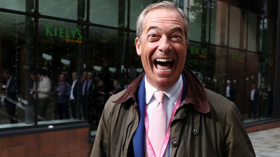 Nigel Farage, former member of the European Parliament reacts as he arrives at Britain’s Conservative Party’s annual conference in Manchester, Britain, October 2, 2023.