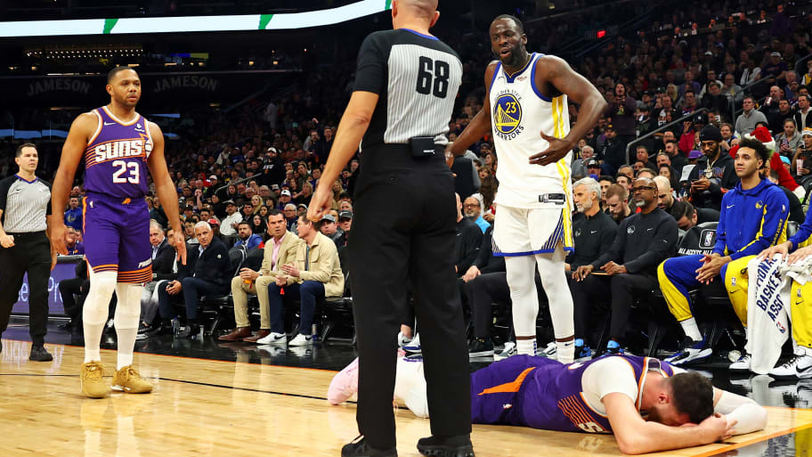 Golden State Warriors forward Draymond Green (23) reacts after being called for a foul on Phoenix Suns center Jusuf Nurkic (20) during the third quarter