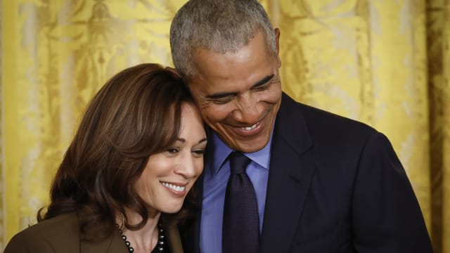 Former President Barack Obama hugs Vice President Kamala Harris