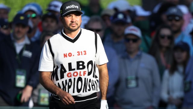 Jason Day leveled up his eclectic grandpa aesthetic at the Masters with a retro vest bearing large red and black letters.