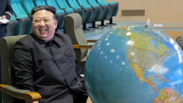 Kim Jong Un visits the National Aerospace Technology Administration to inspect operational readiness of the reconnaissance satellites and view aerospace photographs, in this picture released by the Korean Central News Agency on November 25, 2023. 