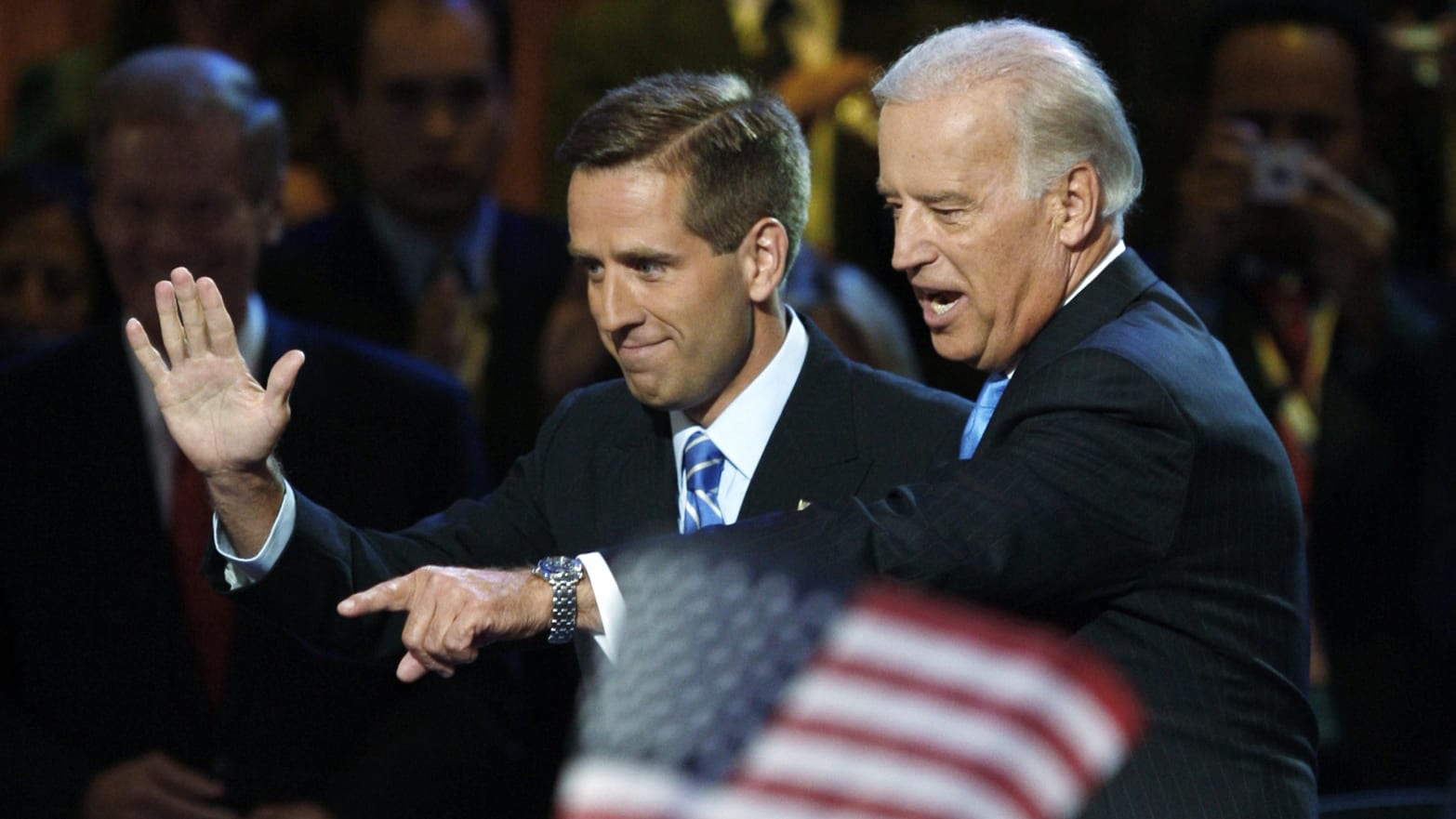 US Democratic vice presidential candidate Senator Joe Biden (D-DE) (R) waves with his son Beau Biden at the 2008 Democratic National Convention in Denver, Colorado.
