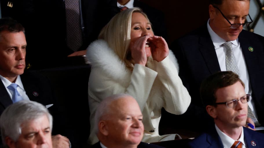 Rep. Marjorie Taylor Greene (R-GA) yells at U.S. President Joe Biden as he delivers his State of the Union address at the U.S. Capitol in Washington, DC. 