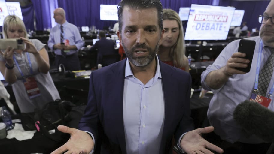 Donald Trump Jr. speaks to the media in the media filing center as a surrogate on behalf of his father, former U.S. President Donald Trump