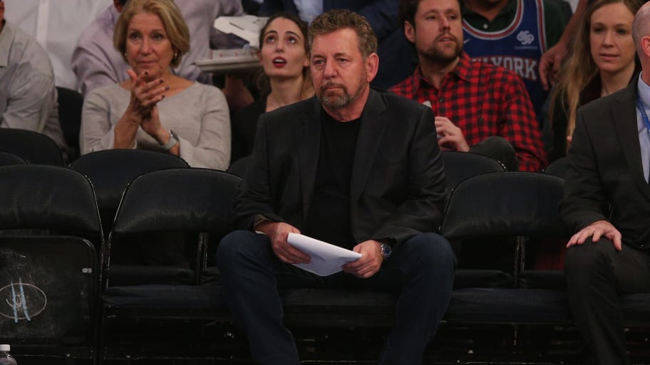 James Dolan watches a basketball game at Madison Square Garden.