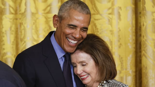Former President Barack Obama hugs House Speaker Nancy Pelosi  at the end of an event to mark the 2010 passage of the Affordable Care Act at the White House on April 5, 2022 in Washington, D.C.