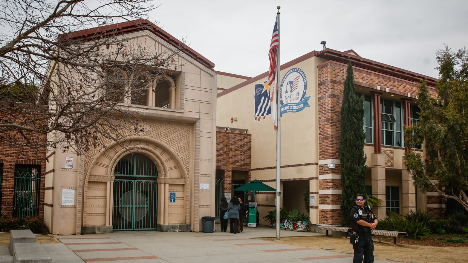 Security guards stand outside at Beverly Vista Middle School on Monday, Feb. 26, 2024 in Beverly Hills, CA.
