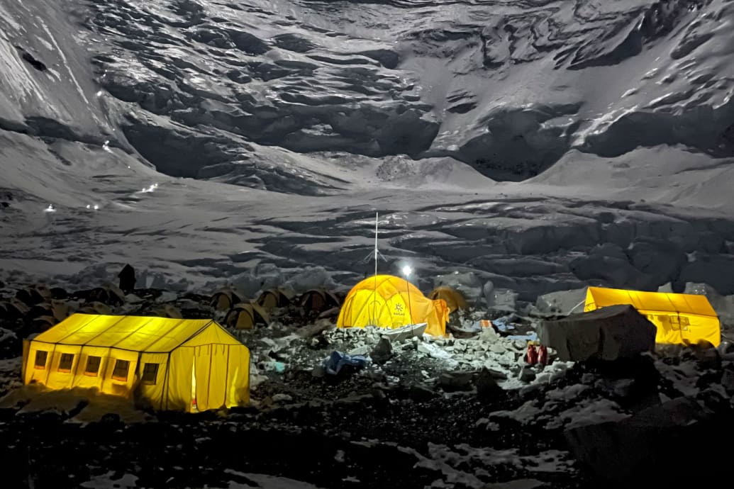 Mountaineers' tents lit up at night at Camp 2 of Mount Everest, in Nepal. 