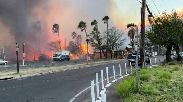 Smoke and flames rise in Lahaina, Maui County, Hawaii, U.S., August 8, 2023 in this still image from video obtained from social media.