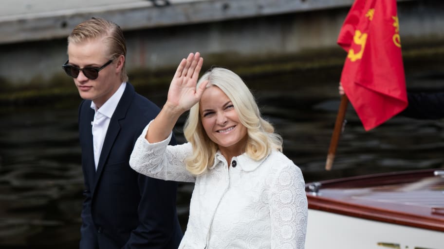 Crown Princess Mette-Marit of Norway and Marius Borg Hoiby walking in 2016.