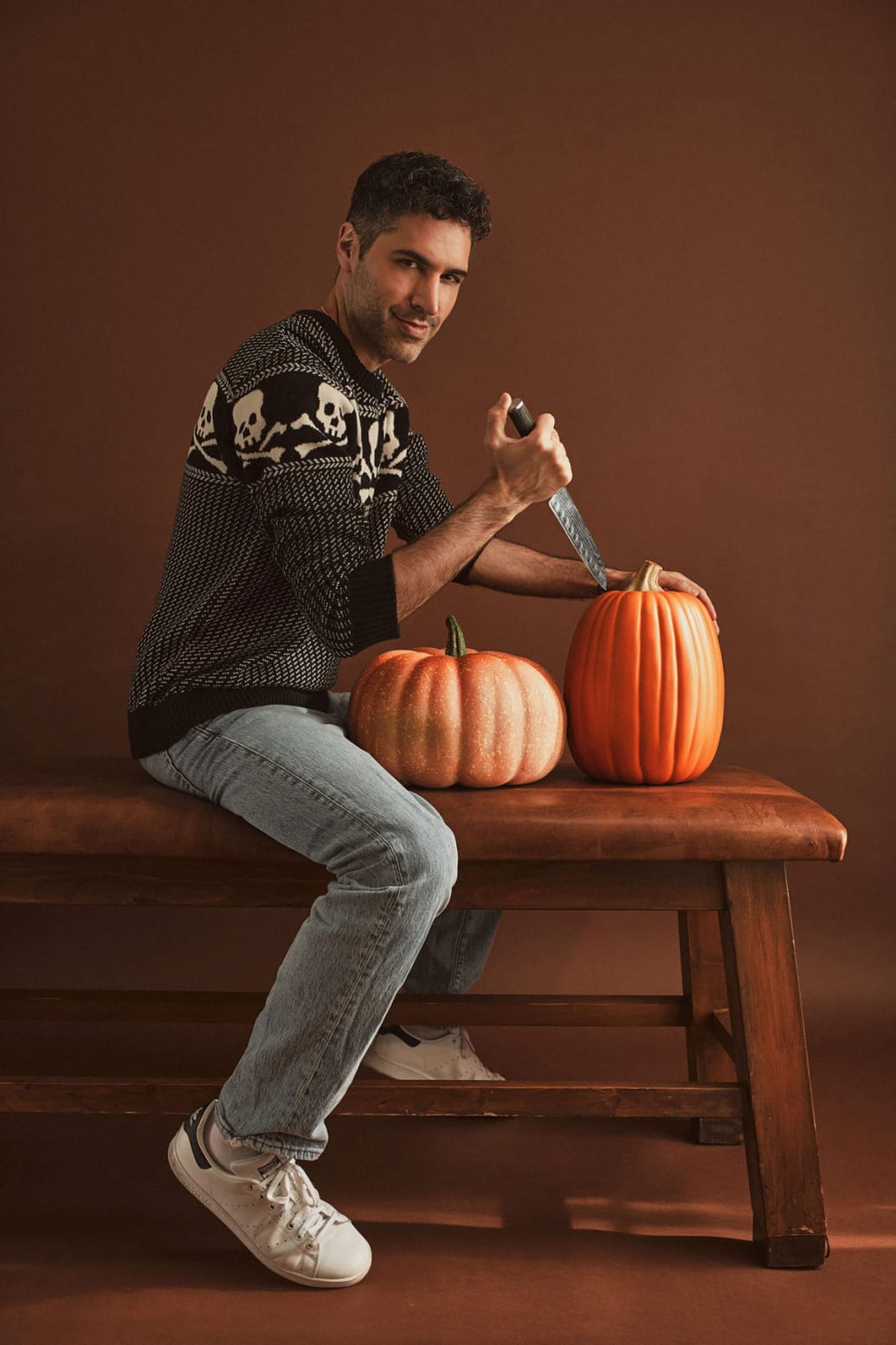 Danny Pellegrino with a knife and pumpkins