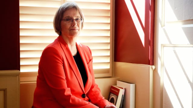 A portrait of Harvard University President Drew Gilpin Faust on campus in June 2017, a year before she stepped down as president.