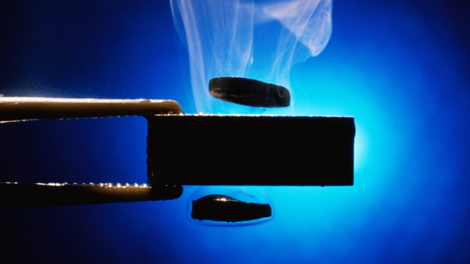 "A supercooled superconductor creates magnetic levitation, as well as steam, due to its low temperature."