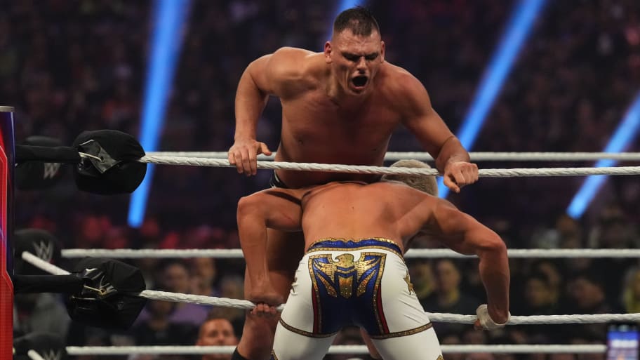 Gunther (black trunks) and Cody Rhodes (white pants) battle during the men’s Royal Rumble match.