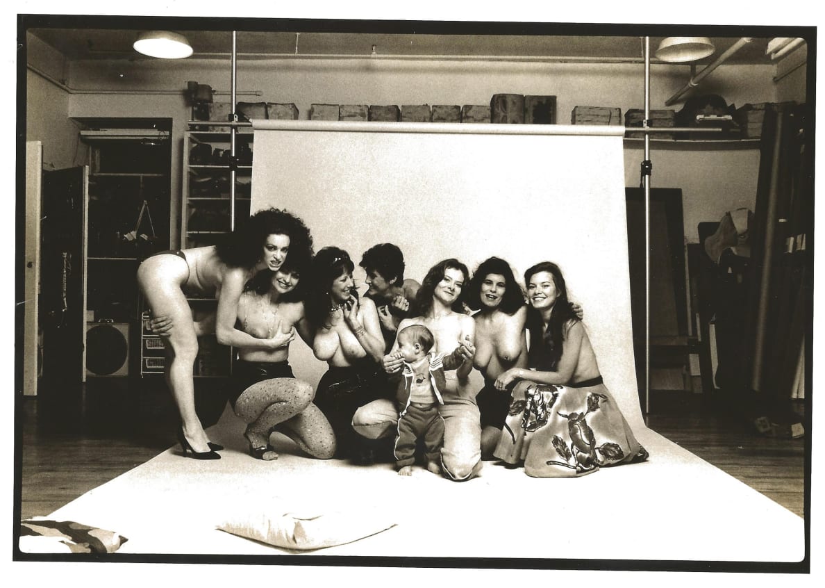 Members of Club 90 and other porn stars pose bare-chested for a group photo with Jane’s baby. 