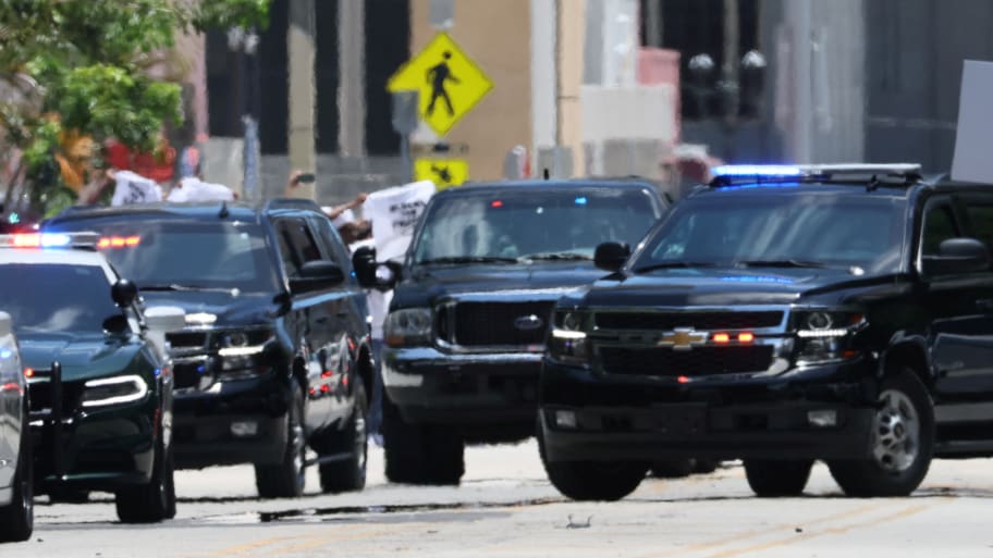 The motorcade of former U.S. President Donald Trump arrives at the Wilkie D. Ferguson Jr. United States Courthouse.