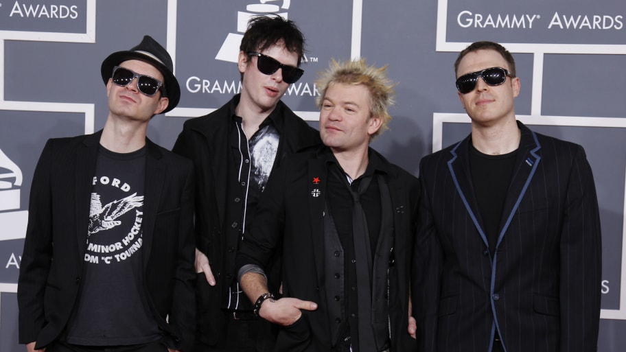 Rock band Sum 41 arrives at the 54th annual Grammy Awards in Los Angeles, California, February 12, 2012. 