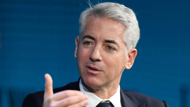 Bill Ackman speaking while wearing a suit and tie