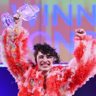Nemo from Switzerland celebrates with the trophy for winning the final of the Eurovision Song Contest (ESC) 2024 in the Malmö Arena.