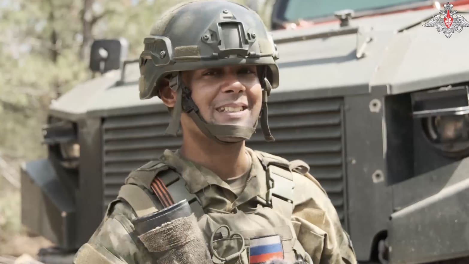 Wilmer Puello-Mota, a former Massachusetts city councilor who allegedly fled the U.S. ahead of a trial for having explicit sexual images of a child, appeared in a new propaganda video released by the Russian Defense Ministry.