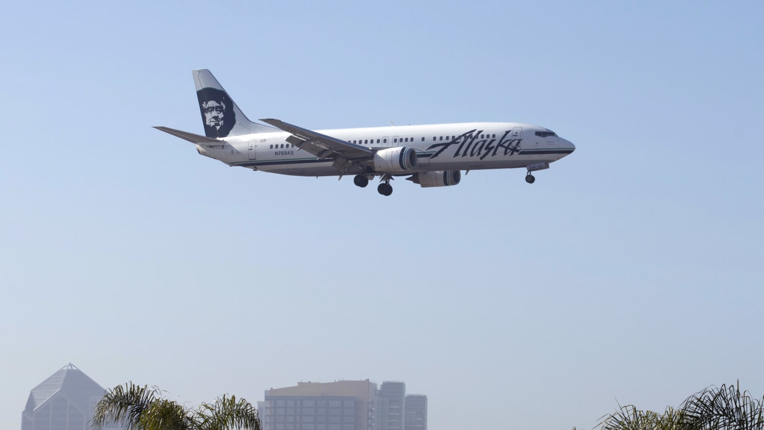 An Alaska Airlines Boeing 737-400 plane is shown on final approach to land in San Diego, California.