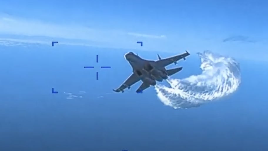 Footage shows Russian fighter jets intercepting a U.S. drone over the Black Sea. 