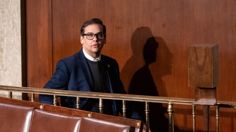 Rep. George Santos walks through the House chamber before the start of the 7th failed attempt to elect a speaker in the Capitol on Thursday, January 5, 2023.