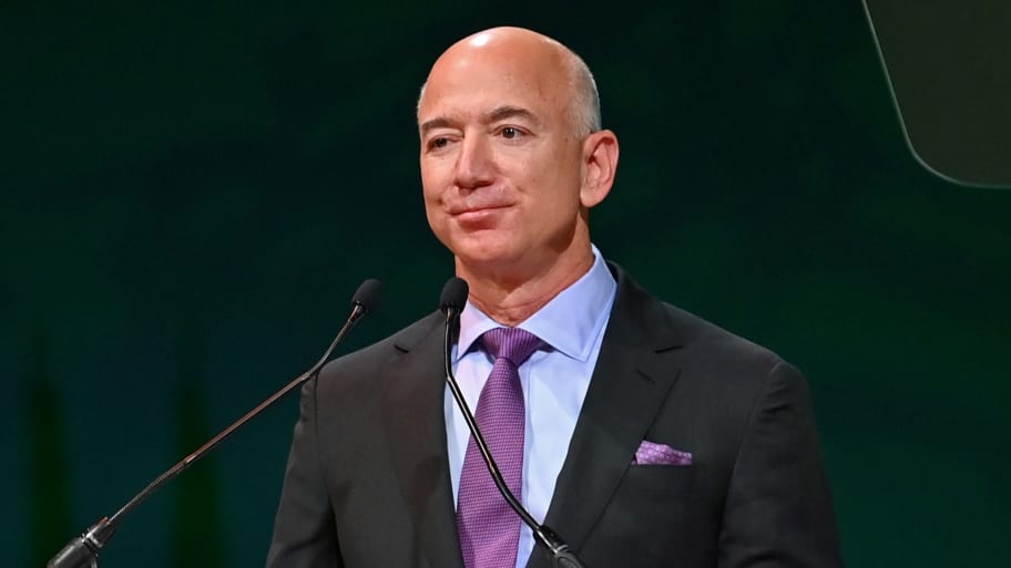 Jeff Bezos speaks on stage at a UN Climate Change Conference.