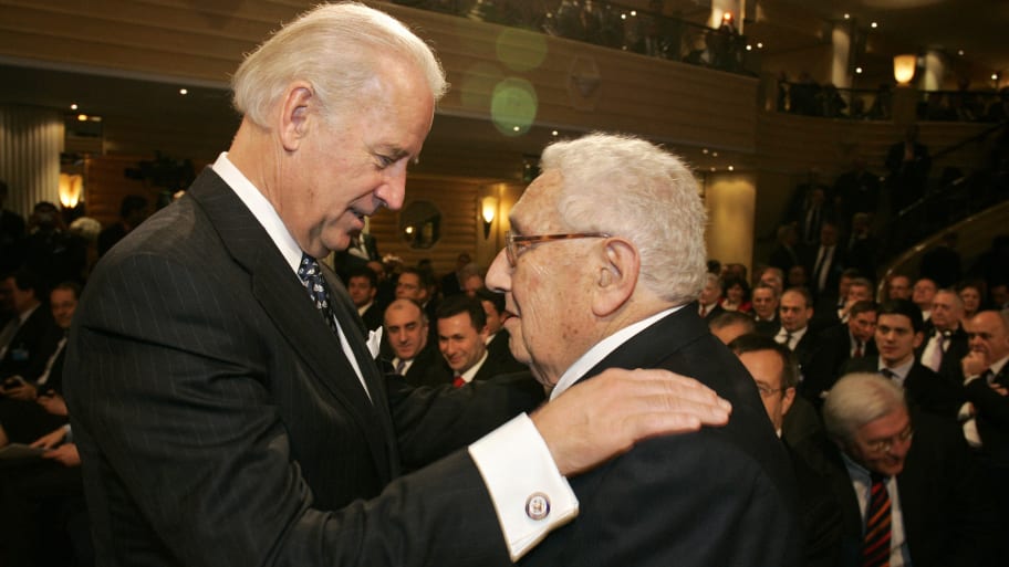 Joe Biden (L) talks with former US Foreign Minister Henry Kissinger on the second day of the 45th Munich Security Conference at the Bayerischer Hof Hotel, southern Germany, on February 7, 2009.